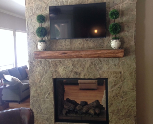 custom stone indoor fireplace