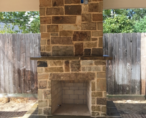 stone outdoor fireplace